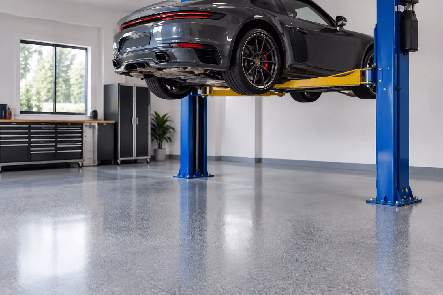 Best Floors for Car Lifts in Home Garages